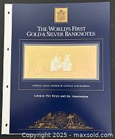 Blue presentation folder front titled "The World's First Gold & Silver Banknotes"