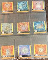 Grid image of all nine cards showing fronts and numbering