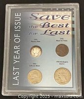 Front view of sealed coin set showing obverse of four coins and printed title