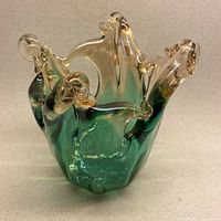 Overall view showing turquoise body and clear pulled arms rim