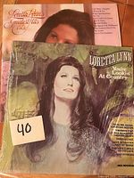 Front covers of both Loretta Lynn albums with lot sticker