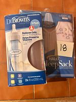 Dr. Brown’s 2-pack bottle box alongside packaged Halo SleepSack