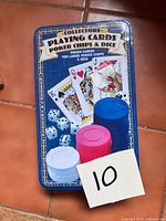 Front of blue Cardinal tin showing set contents pictures and label
