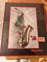 Full view of framed Symphony saxophone print