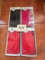 All four boxed Stella & Fritz wallets showing colors and quantity