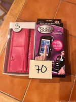 Front view of both boxed items: Touch Purse and hot pink Stella & Fritz wallet