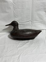Left side view of full wooden duck decoy