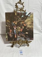 Front jacket artwork on display stand