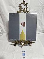 Front sleeve on ornate stand showing album artwork