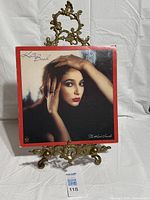 Front album cover on display stand