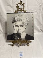 Front jacket showing Madonna portrait and title