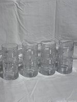Set of four matching crystal highball glasses