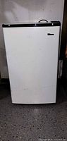 Full front view of compact refrigerator