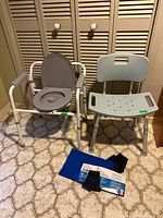 Commode chair, shower chair and hot/cold compress grouped