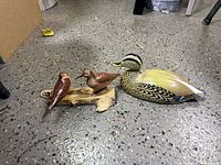 All three bird decoys displayed together