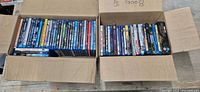 Two boxes filled with Blu-ray discs