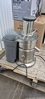 Full view of Breville Juice Fountain Elite juicer with pulp container and cord