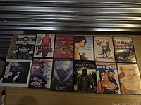 All eleven DVD cases laid out on table