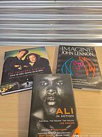 All three books displayed on tabletop