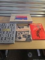 Five books displayed on tabletop