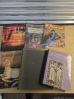 Top view of six books on tabletop