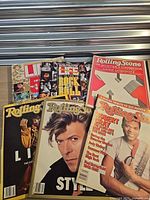 All six magazines laid out, showing covers and titles