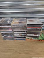 Overall view of both CD stacks and three Vinyl Cafe box sets