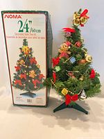 Tree next to box showing overall kit contents