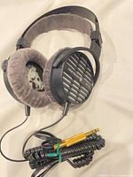 Full view of Beyerdynamic DT 511 headphones with coiled cable and 6.35 mm plug