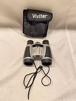 Vivitar binoculars front view with carrying case