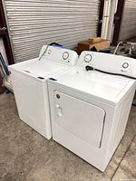 Front view of Amana washer and dryer pair