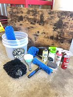 All items grouped: bucket, chemicals, brushes, mitts, applicators