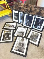 All nine framed photographs displayed together