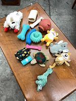 Overview of all dog toys and accessories on table