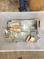 tub with assorted broken tiles, view from above