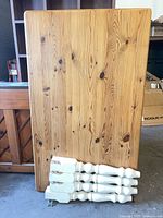 Front view of pine table top positioned vertically