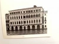 Overall view of the matted black-and-white photograph showing the subject building and mat