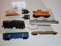 Overall lot layout showing all train cars and parts