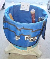 Side view of Bucketeer organizer on wheeled base with tools inside