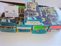 Stacked Athearn blue-box packages for all nine pieces