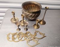 Entire lot showing bowl, candlesticks, cordials, bird plaques