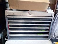 Front view showing six drawers