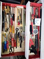 Overview of three drawer trays filled with assorted hand tools