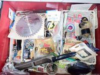 Drawer view showing entire assortment of tools and hardware