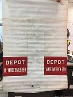 Front of canvas roll showing red destination panels with text "DEPOT R. VANDERMEEREN" and "DEPOT VANDERMEEREN STR."