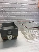 Wire basket and metal film can half side by side