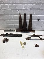 Overall view showing strap hinges, slide bolts, pull handle, hinges and screws