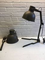 Both lamps showing folding bases and shades