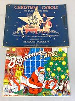 Front covers of both vintage carol books