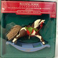 Front view of boxed 1985 Hallmark rocking horse ornament